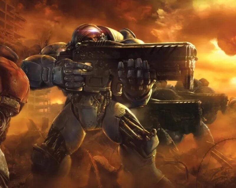 Ilustracja sci-fi przedstawiająca żołnierza Terran Marine (StarCraft) w masywnym pancerzu wspomaganym, celującego z ciężkiego karabinu. Postać stoi na tle apokaliptycznego krajobrazu zrujnowanego miasta. Tło spowite jest gęstymi chmurami dymu i pyłu, skąpanymi w ognistych odcieniach pomarańczu i złota, sugerując trwającą bitwę. Ilustracja sugeruje, że Murray pracuje nad StarCraft